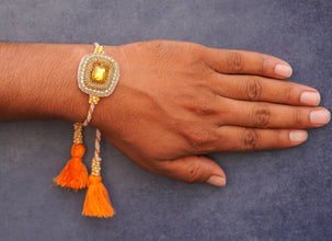 Orange white stone bhai rakhi