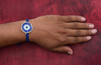 Blue evil eye pearl bhai rakhi
