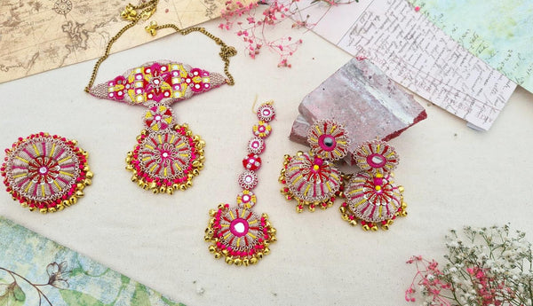 Radiant Pink and Gold Beaded Jewelry Set with Circular Floral Patterns