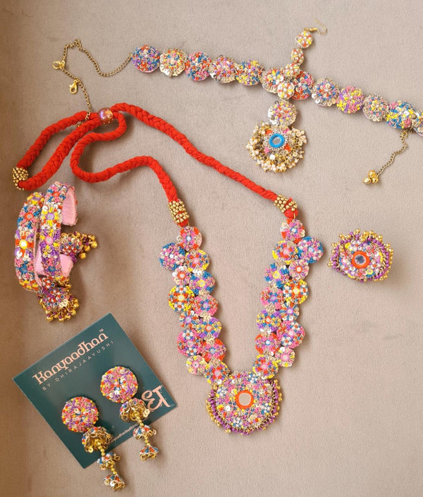 Radiant Multicolored Beaded Jewelry Set with Floral Designs and Red Cord Accents