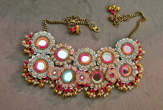 Elegant Cascading Earrings with Pastels Floral Motifs and Central Lustrous Stone Accents