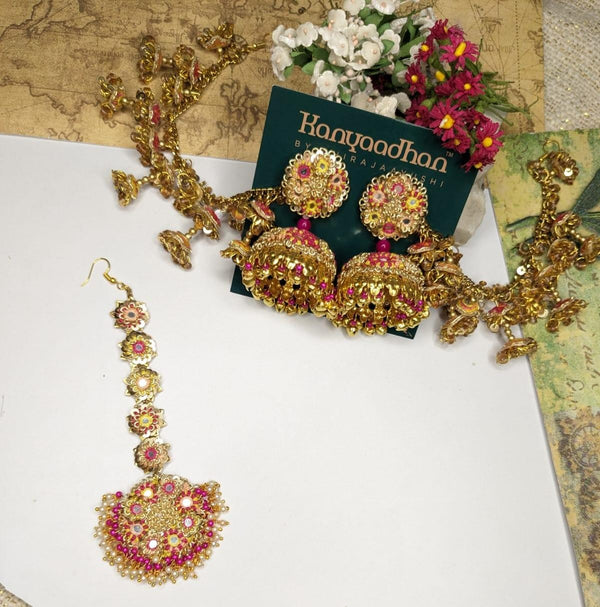 Golden Majesty Ensemble: Radiant Necklaces, shop-by-style, shop-by-vibe, Earrings, and Tikka Set with Pink Gemstone Highlights.