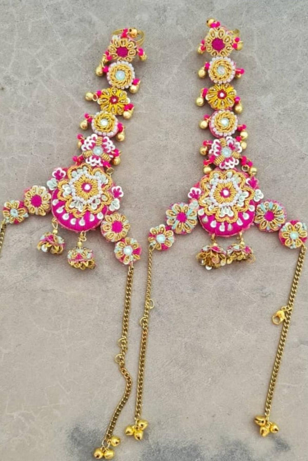Gold-Encrusted Set with Multicolored Gemstones and Delicate Pink Tassel Accents.