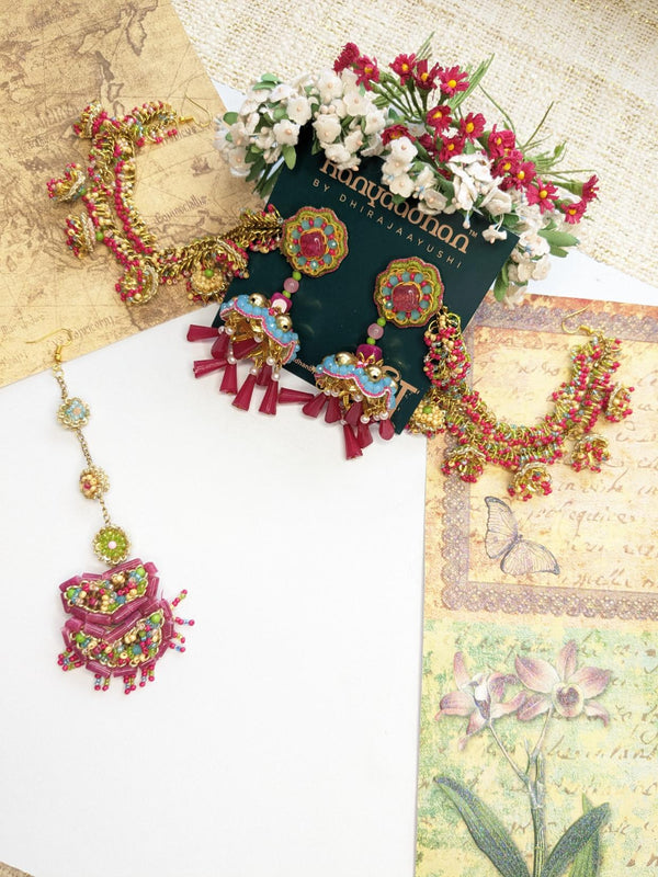 Gold-Infused Necklaces, shop-by-style, shop-by-vibe, Earrings, and Sheeshpatti with Vivid Gemstones, Delicate White Floral Accents, and Rich Magenta Tassels