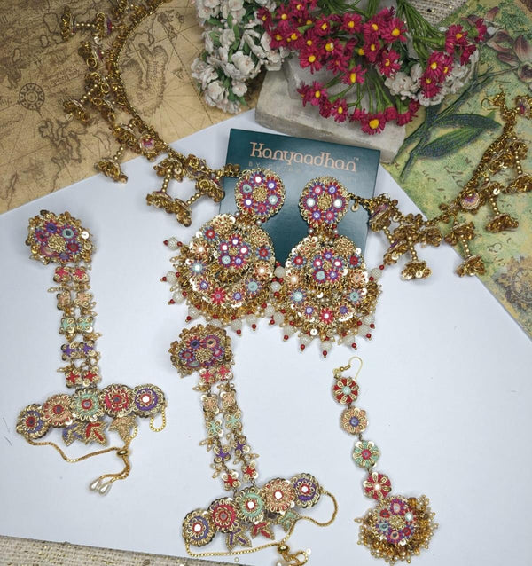 Elegant Jewelry Set with Earrings, Necklaces, shop-by-style, shop-by-vibe, and Bracelet Adorned with Multicolored Gemstones in Floral Patterns.