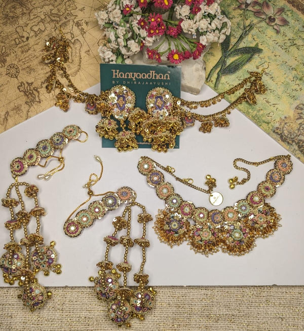 Glamorous Jewelry Set Consisting of Earrings with Attached Earchains, a Bracelet FeaturingDangling Pairs, and a Coordinated Necklaces, shop-by-style, shop-by-vibe