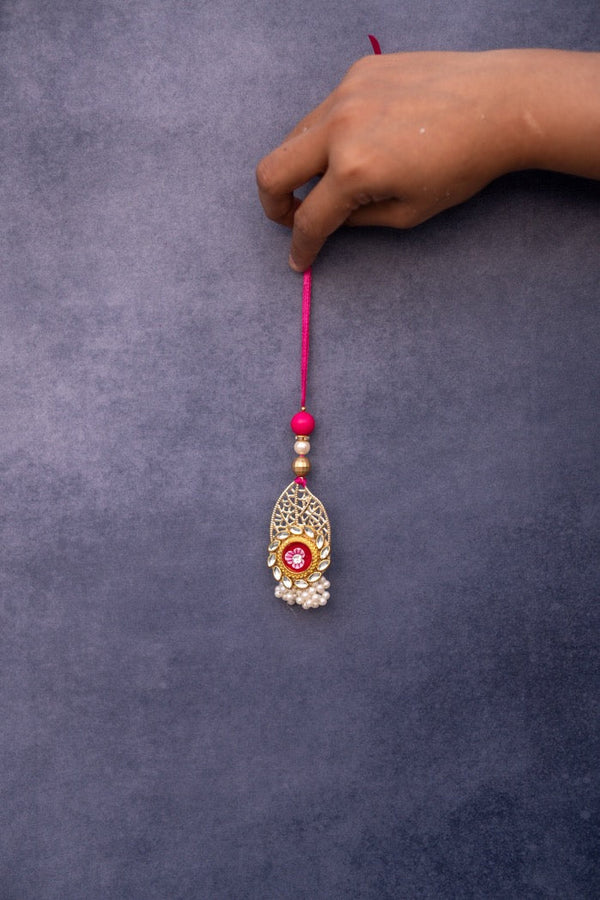 Metal Red Stone Rakhi Pair set