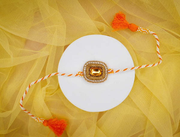 Orange white stone bhai rakhi
