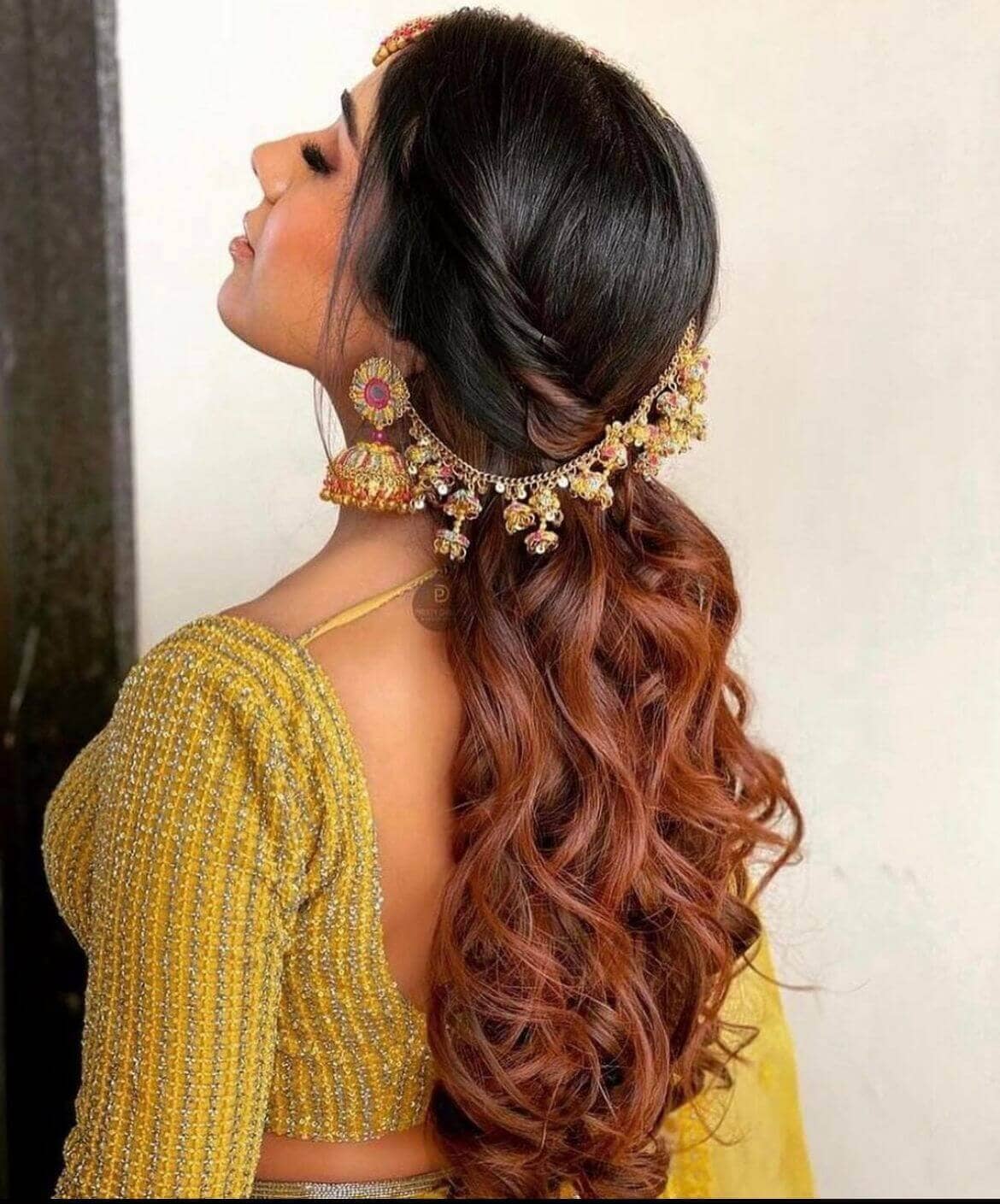 kanyaadhan bride in beautiful earrings with hair accessories